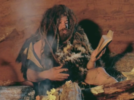 Stone Age Person Reading a book